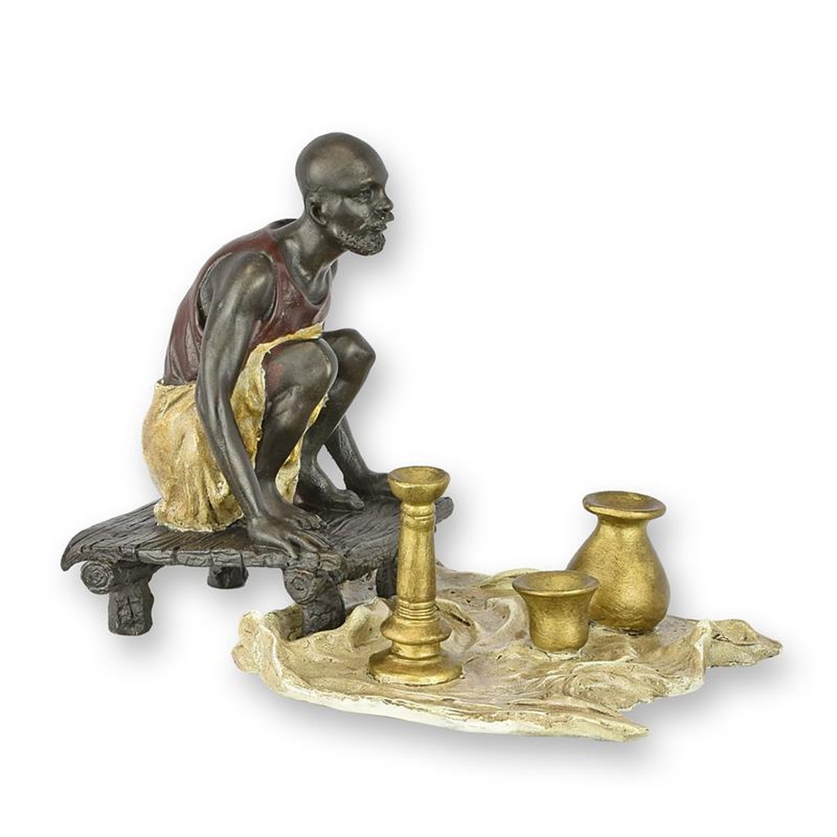 A BRONZE SCULPTURE OF AN ARAB POTTERY VENDOR