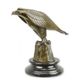 A BRONZE SCULPTURE OF AN EAGLE