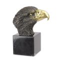 A BRONZE SCULPTURE OF AN EAGLE HEAD