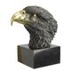 A BRONZE SCULPTURE OF AN EAGLE HEAD