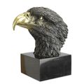 A BRONZE SCULPTURE OF AN EAGLE HEAD