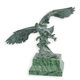 A BRONZE SCULPTURE OF AN EAGLE IN FLIGHT