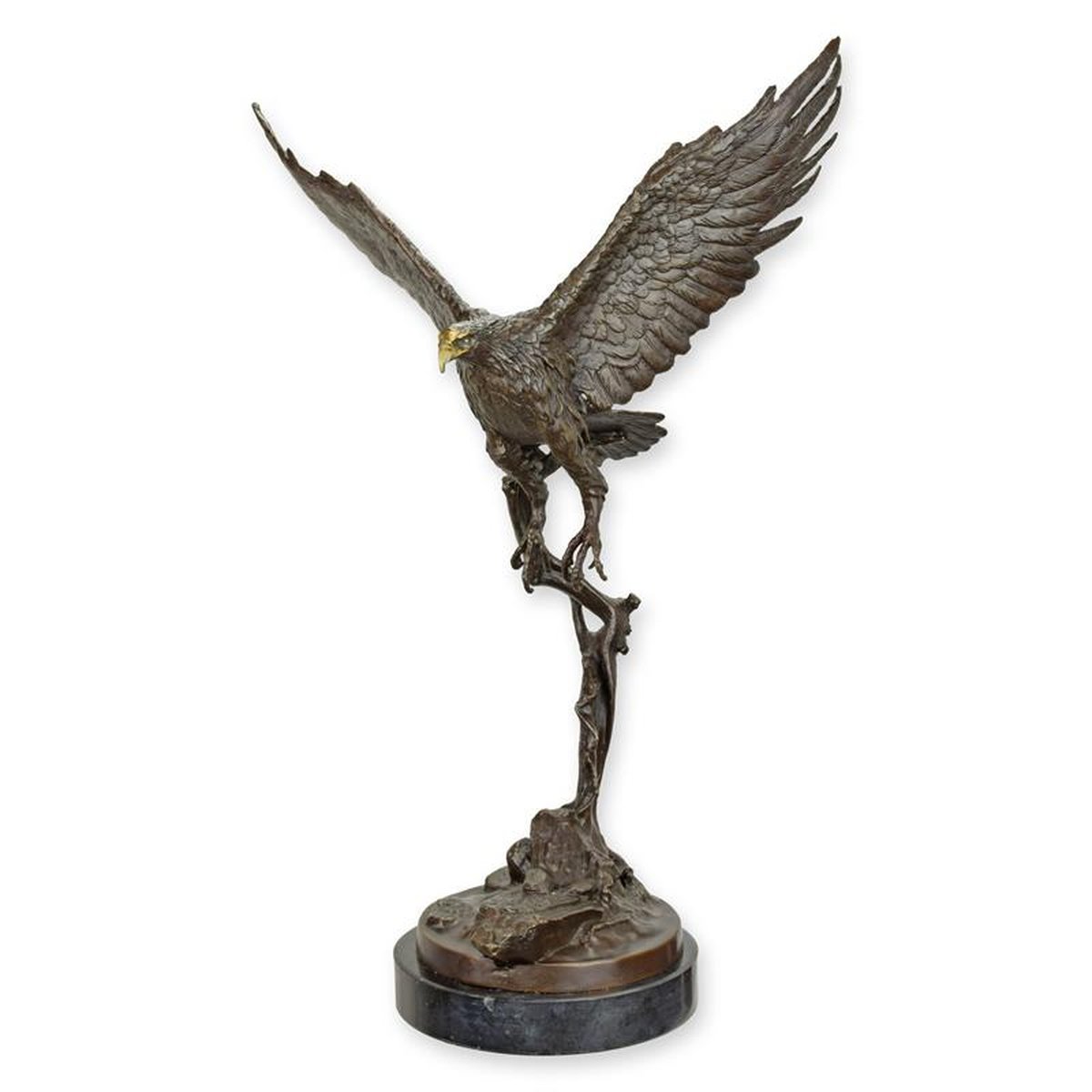 A BRONZE SCULPTURE OF AN EAGLE IN FLIGHT