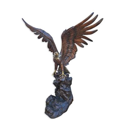 A Bronze Sculpture of an Eagle on a Rock