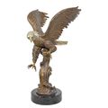 A BRONZE SCULPTURE OF AN EAGLE