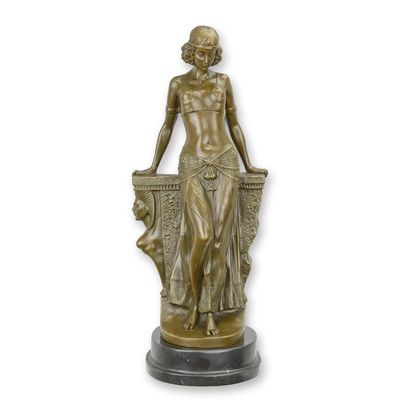 A BRONZE SCULPTURE OF AN EGYPTIAN DANCER