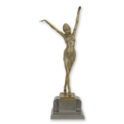 A BRONZE SCULPTURE OF AN EGYPTIAN DANCER