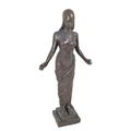 A BRONZE SCULPTURE OF AN EGYPTIAN DANCER