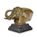 A BRONZE SCULPTURE OF AN ELEPHANT HEAD