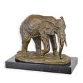 A BRONZE SCULPTURE OF AN ELEPHANT
