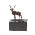 A BRONZE SCULPTURE OF AN IMPALA
