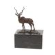 A BRONZE SCULPTURE OF AN IMPALA