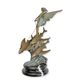 A BRONZE SCULPTURE OF AN OCEAN FAIRY RIDING FLYING FISH