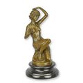 A BRONZE SCULPTURE OF AN ORIENTAL DANCER