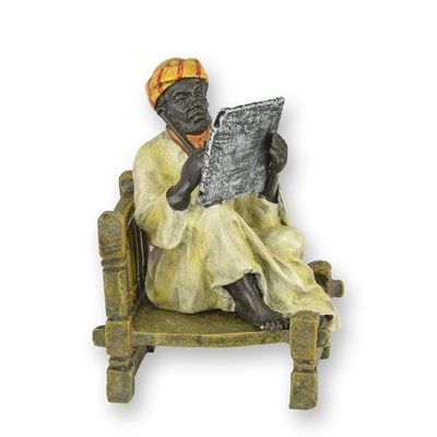 A BRONZE SCULPTURE OF AN ORIENTAL POET