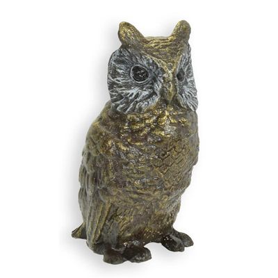 A BRONZE SCULPTURE OF AN OWL