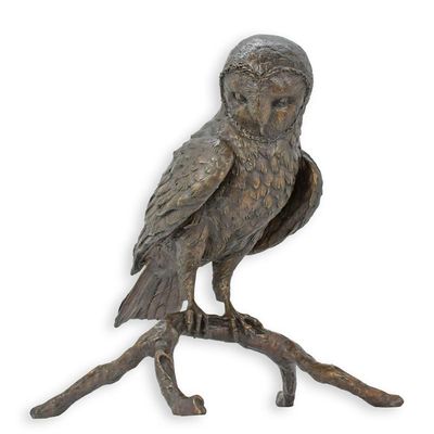 A BRONZE SCULPTURE OF AN OWL ON A BRANCH