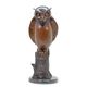 A BRONZE SCULPTURE OF AN OWL
