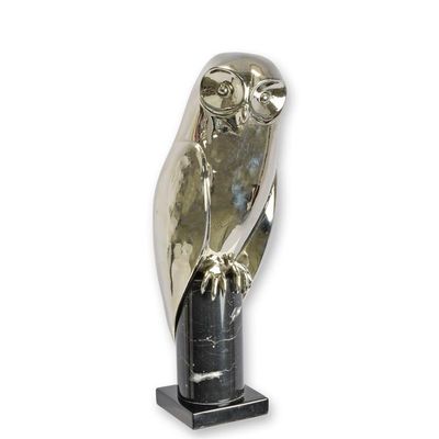 A BRONZE SCULPTURE OF AN OWL
