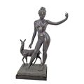 A BRONZE SCULPTURE OF DIANA WITH DOE