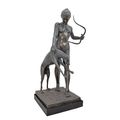 A BRONZE SCULPTURE OF DIANA WITH HOUND