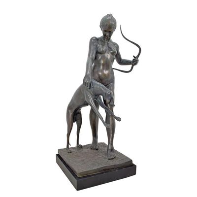A BRONZE SCULPTURE OF DIANA WITH HOUND