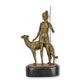 A BRONZE SCULPTURE OF DIANA WITH HOUND