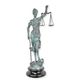 A BRONZE SCULPTURE OF LADY JUSTICE GREEN FINISH