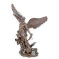 A BRONZE SCULPTURE OF SAINT MICHAEL KILLING THE DEVIL