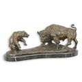 A BRONZE SCULPTURE OF THE BULL AND BEAR
