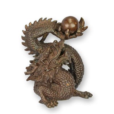 A BRONZE SCULPTURE OF THE PEARL OF WISDOM - BROWN
