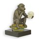 A BRONZE SCULPTURE OF THE PHILOSOPHIZING DARWIN MONKEY