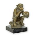 A BRONZE SCULPTURE OF THE PHILOSOPHIZING DARWIN MONKEY