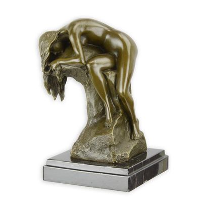 A BRONZE SCULPTURE OF THE SLEEPING NUDE