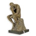 A BRONZE SCULPTURE OF THE THINKER