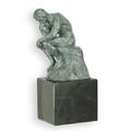 A BRONZE SCULPTURE OF THE THINKER - GREEN FINISH