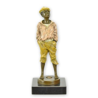 A BRONZE SCULPTURE OF THE WHISTLER
