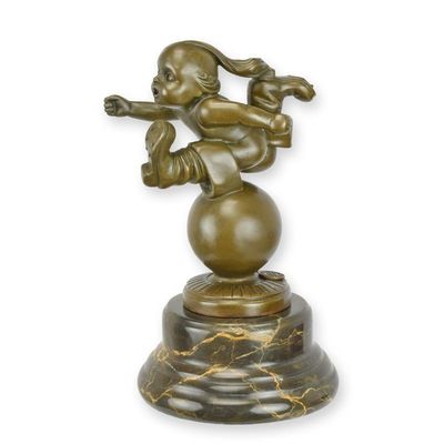 A BRONZE SCULPTURE OF TOM THUMB