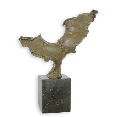 A BRONZE SCULPTURE OF TWO FACES KISSING