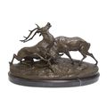 A BRONZE SCULPTURE OF TWO FIGHTING STAGS