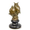 A BRONZE SCULPTURE OF TWO OWLS ON A BRANCH (BRASS PLATE UNDE
