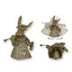 A BRONZE TABLE BELL OF A RABBIT AS QUEEN OF HEARTS