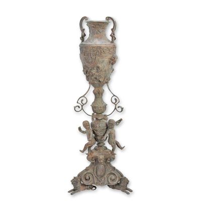 A BRONZE URN ON PIEDESTAL