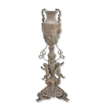 A BRONZE URN ON PIEDESTAL