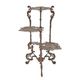 A CAST IRON 3 TIER FLOWER TABLE - BROWN
