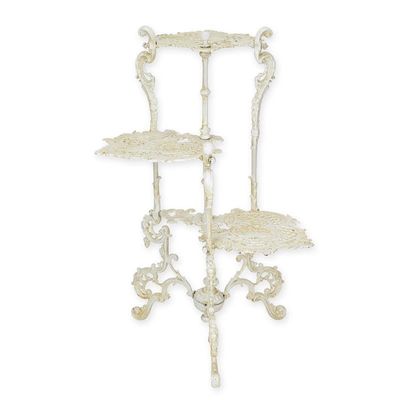 A CAST IRON 3 TIER FLOWER TABLE - WHITE