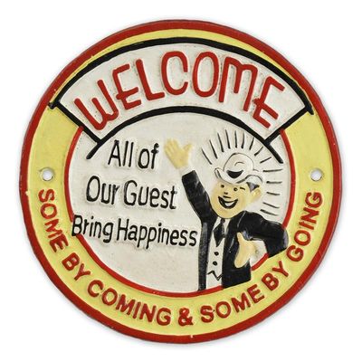 A CAST IRON ALL OF OUR GUESTS BRING HAPPINESS" PLAQUE"