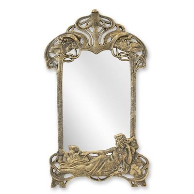 A CAST IRON ART NOUVEAU WALL MIRROR