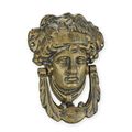 A CAST IRON ATHENA DOOR KNOCKER