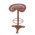 A CAST IRON BAR STOOL - RED